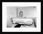 One year old baby girl enjoys her bath, ca. 1953 by Anonymous