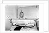 One year old baby girl enjoys her bath, ca. 1953 by Anonymous