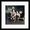 Two brothers sit on the bumper of the family Mercedes Benz in Germany, ca. 1949 by Anonymous