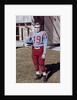 Fifteen year old high school football player portrait outside the school, ca. 1961 by Anonymous