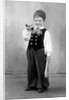Six year old boy in Bavarian costume holds a pipe, ca. 1947 by Anonymous