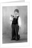 Six year old boy in Bavarian costume holds a pipe, ca. 1947 by Anonymous
