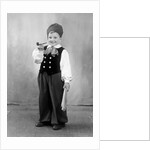 Six year old boy in Bavarian costume holds a pipe, ca. 1947 by Anonymous