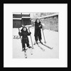 Two brothers stand on their skis in the snow, ca. 1950 by Anonymous