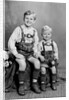 Two brothers pose for a childhood portrait in Germany, ca. 1949 by Anonymous