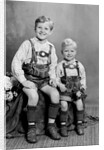 Two brothers pose for a childhood portrait in Germany, ca. 1949 by Anonymous