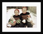 Two brothers sit with Easter decorations outside in Germany, ca. 1948 by Anonymous