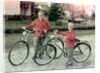 Two brothers stand with their new bikes in Wisconsin, ca. 1953 by Anonymous