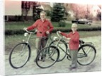 Two brothers stand with their new bikes in Wisconsin, ca. 1953 by Anonymous
