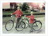 Two brothers stand with their new bikes in Wisconsin, ca. 1953 by Anonymous