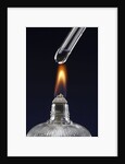 Test tube with liquid, over flame by Anonymous