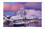 Fishing village of Hamnoy below Klokketinden peak by Anonymous