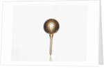 Gold golf ball and tee by Anonymous