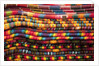 Textiles for sale in market in San Miguel de Allende by Anonymous