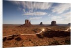 Night view of Monument Valley under the light of a full moon by Anonymous