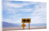 Road warning sign in Death Valley National Park by Anonymous