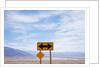 Road warning sign in Death Valley National Park by Anonymous