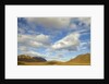 Cumulus clouds above tundra and mountains in Denali National Park by Anonymous