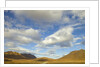 Cumulus clouds above tundra and mountains in Denali National Park by Anonymous