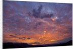 Colored clouds above Colorado River at sunset by Anonymous