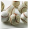 Old and new baseballs gathered together by Anonymous