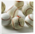 Old and new baseballs gathered together by Anonymous