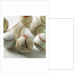 Old and new baseballs gathered together by Anonymous