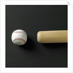 Directly-above view of a bat and a ball in a row by Anonymous