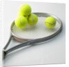 A tennis racket and balls by Anonymous