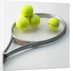 A tennis racket and balls by Anonymous