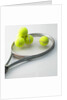 A tennis racket and balls by Anonymous