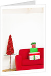 Stack of Christmas gifts on sofa by Anonymous