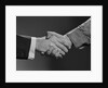 Close-up handshake between businessman and laborer by Anonymous