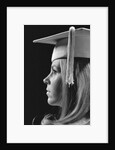 Profile blond female graduate wearing white mortarboard by Anonymous