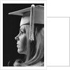 Profile blond female graduate wearing white mortarboard by Anonymous