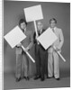 Trio of businessmen carrying blank signs by Anonymous