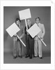 Trio of businessmen carrying blank signs by Anonymous