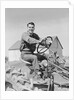 Smiling man farmer driving tractor by Anonymous