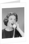 Excited woman talking on telephone by Anonymous