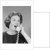 Excited woman talking on telephone by Anonymous