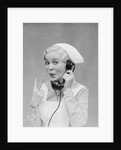 Smiling blond nurse with surprised expression talking on telephone holding up two fingers by Anonymous