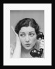Young brunette woman with surprised expression hand to head talking on telephone by Anonymous