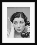 Young brunette woman with surprised expression hand to head talking on telephone by Anonymous