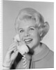 Portrait smiling stylish woman talking on telephone by Anonymous