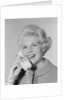 Portrait smiling stylish woman talking on telephone by Anonymous