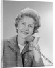 Portrait smiling mature woman talking on telephone by Anonymous