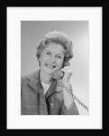 Portrait smiling mature woman talking on telephone by Anonymous