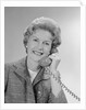 Portrait smiling mature woman talking on telephone by Anonymous