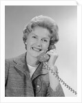 Portrait smiling mature woman talking on telephone by Anonymous