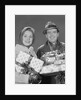 Couple man and woman holding wrapped christmas presents and packages by Anonymous